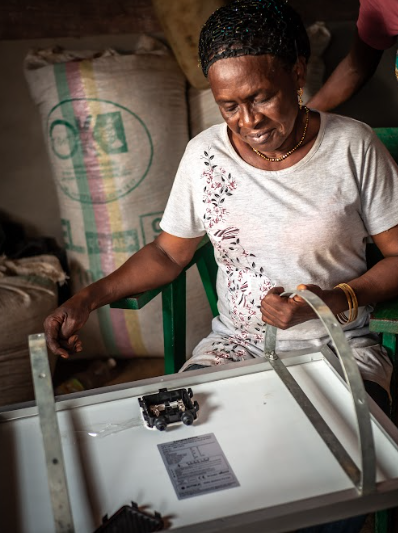 solar electricity panel Cameroon engineer woman